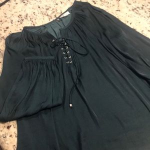 Jennifer Lopez large deep Emerald green top